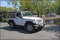 white_jeep_checking_out